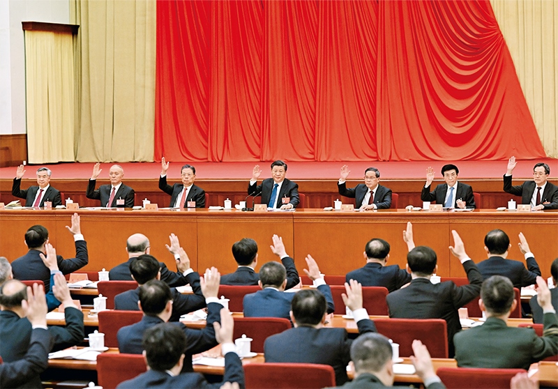 中國共產(chǎn)黨第二十屆中央委員會第二次全體會議，于2023年2月26日至28日在北京舉行。這是習(xí)近平、李強、趙樂際、王滬寧、蔡奇、丁薛祥、李希等在主席臺上。 新華社記者 謝環(huán)馳/攝